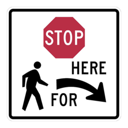 stop here for pedestrians right sign