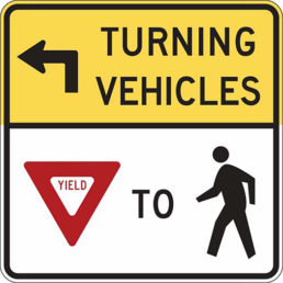 turning vehicle yield to pedestrian left sign