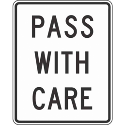 Pass with care sign