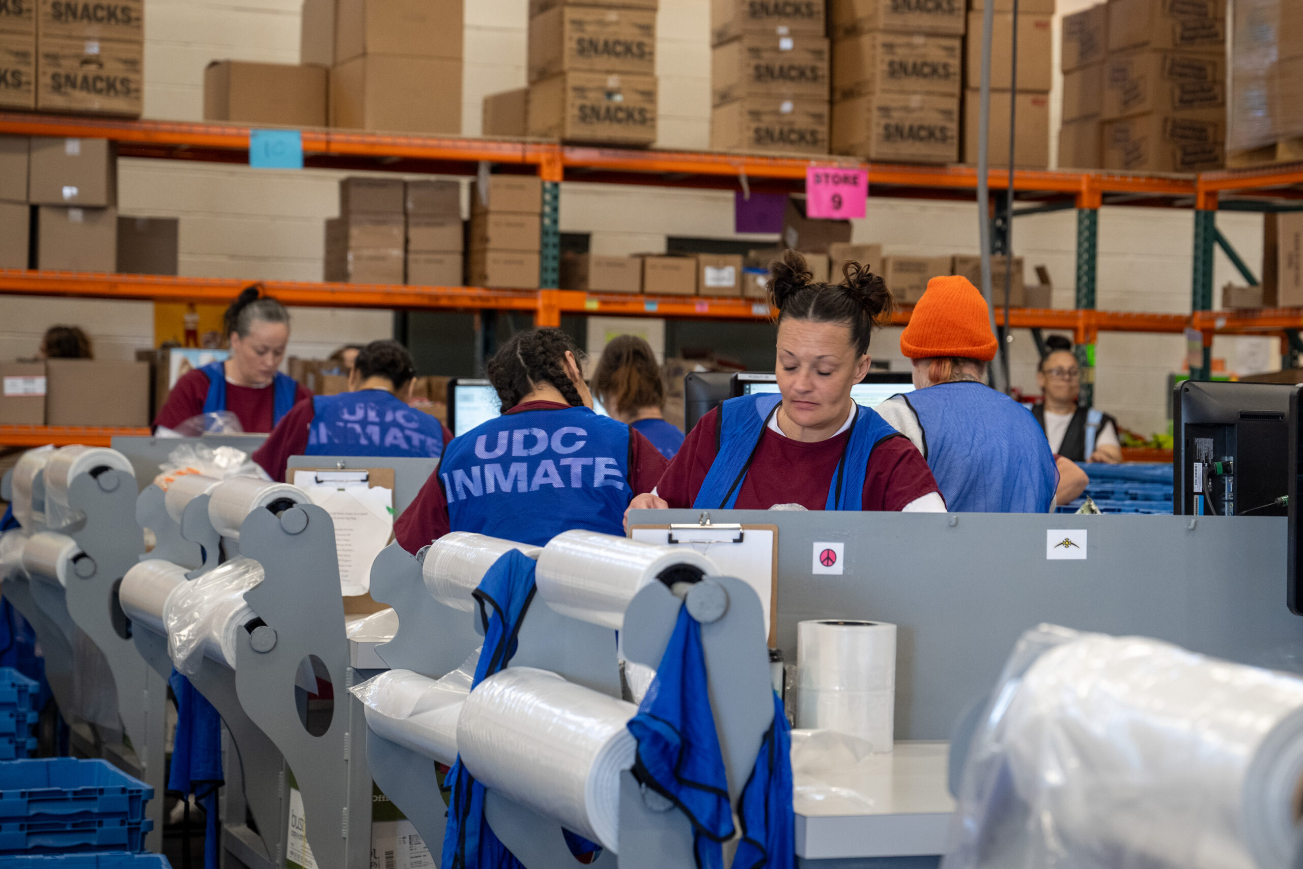 Female program participants working at the UCI Commissary.