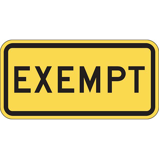 EXEMPT 24X12: Yellow sign with EXEMPT in bold black letters.