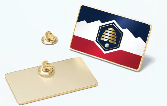 Pins with the new Utah state flag printed on them