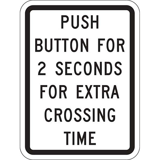 PUSH BUTTON . . . EXTRA CROSSING TIME 9X12 sign: Push button for 2 sec for extra crossing time.